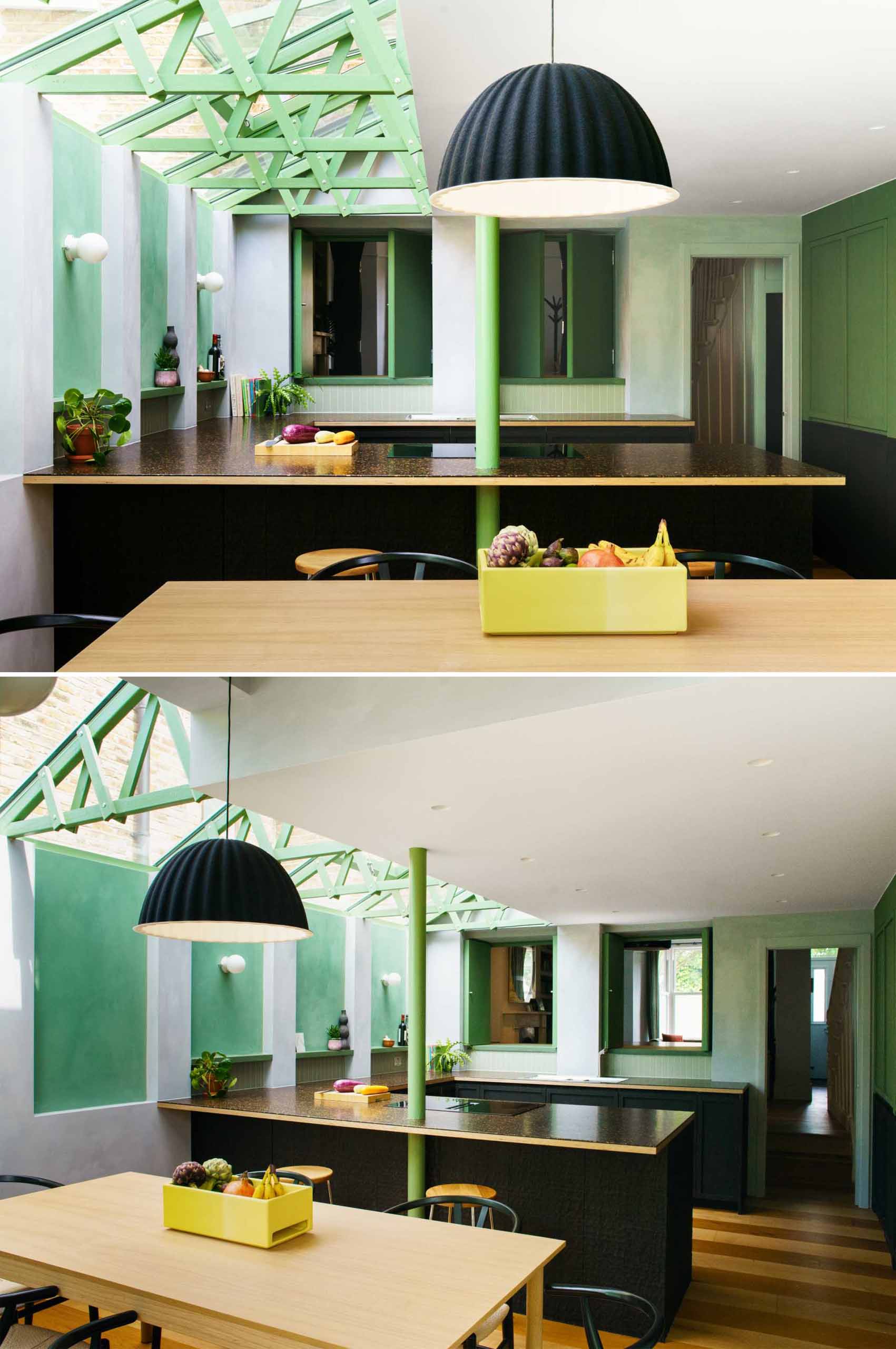 A modern home extension with a curved window, a skylight, and a new dining area and custom kitchen with IKEA cabinets.